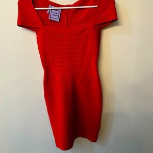 Radiant Rouge: Unleash Your Inner Diva with a Curve-Enhancing Herve Leger Dress!